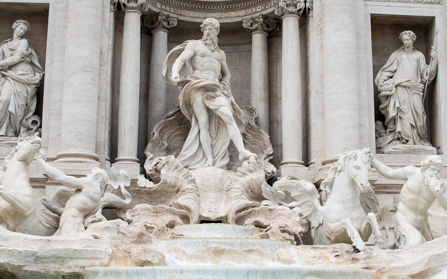 snapshot of the statues of the trevi fountain