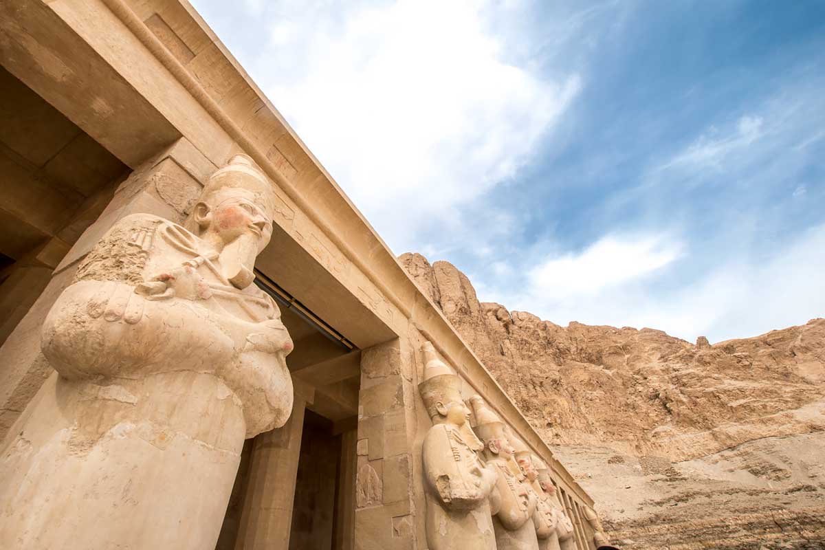 statues of rameses in the hatshepsut temple