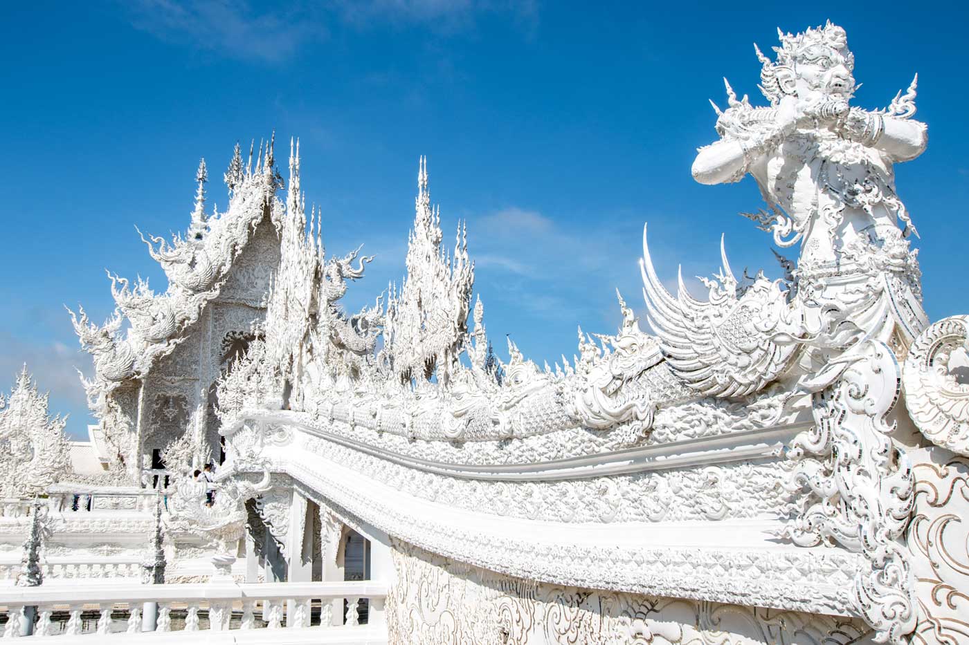 white temple of chiang rai-guarded bridge