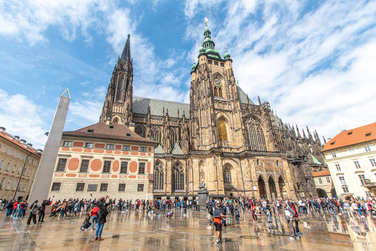 what is prague famous for - Prague's Castle Complex full of people after rain