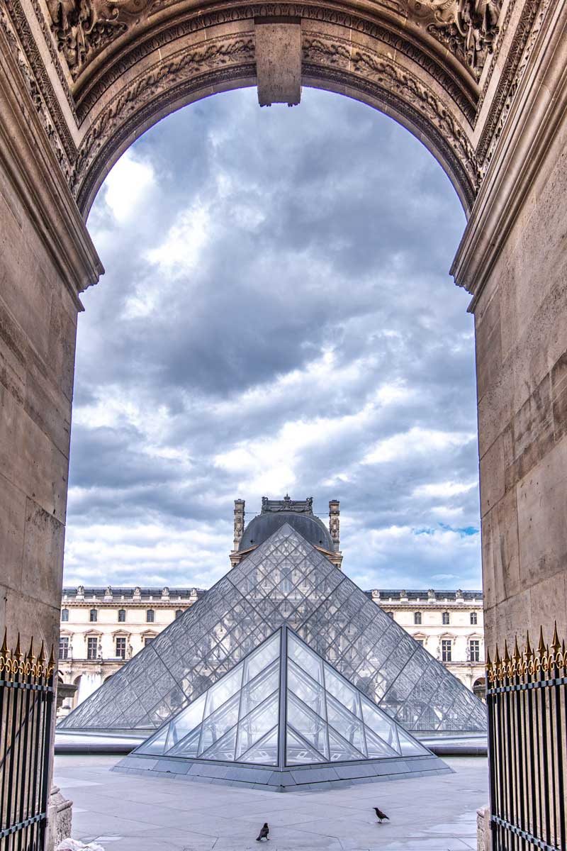 Storm clouds above the Louvre