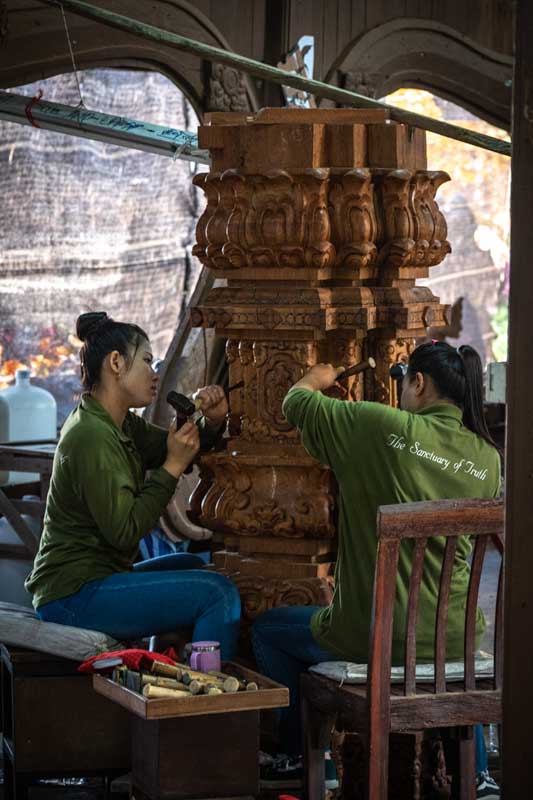 girls-carving-wood-in-thailand