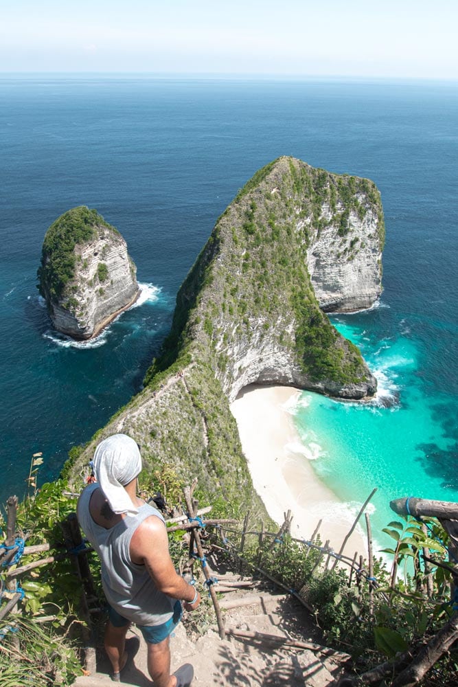 bali-bucket-list-man-watching-down-on-a-t-rex-shaped-rock