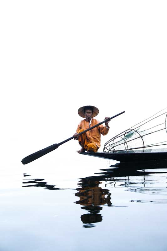 inle-lake-fisherman-sitting-on-its-boat-southeast-asia-bucket-list