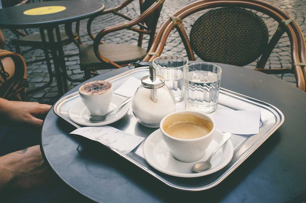 outside-table-with-capuccino-and-espresso