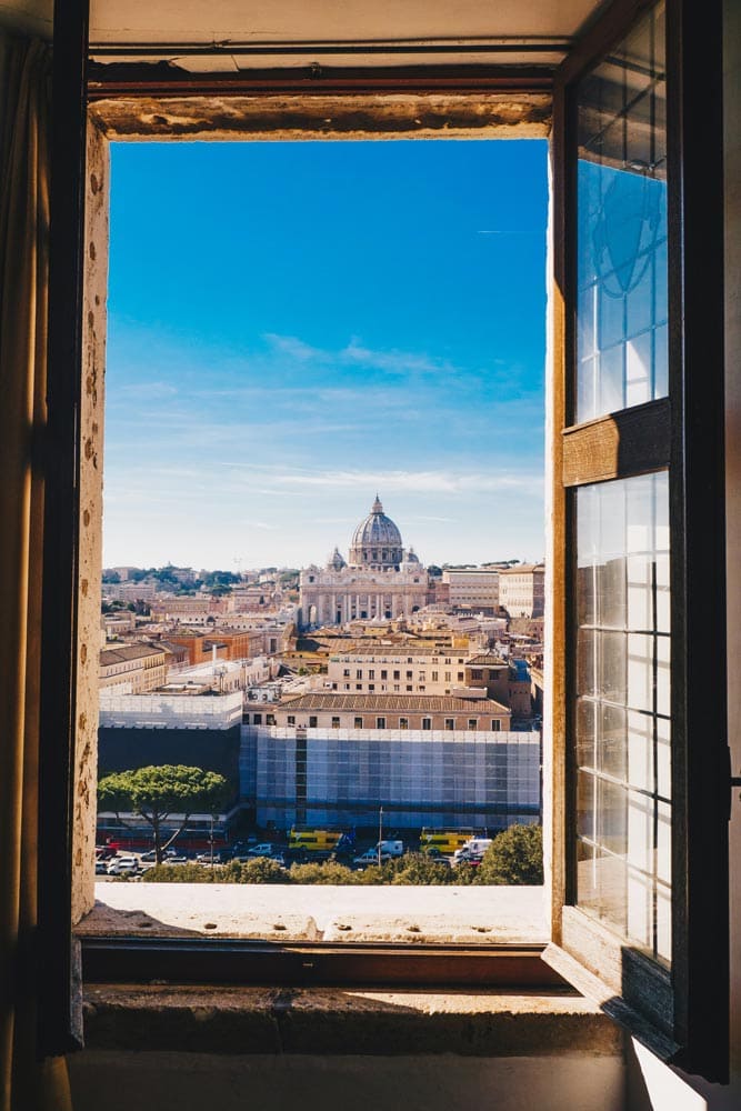 roman-panorama-behind-open-window