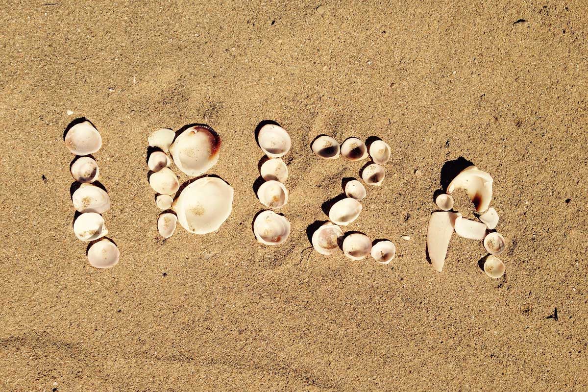 ibiza-written-in-sand-with-shelfish