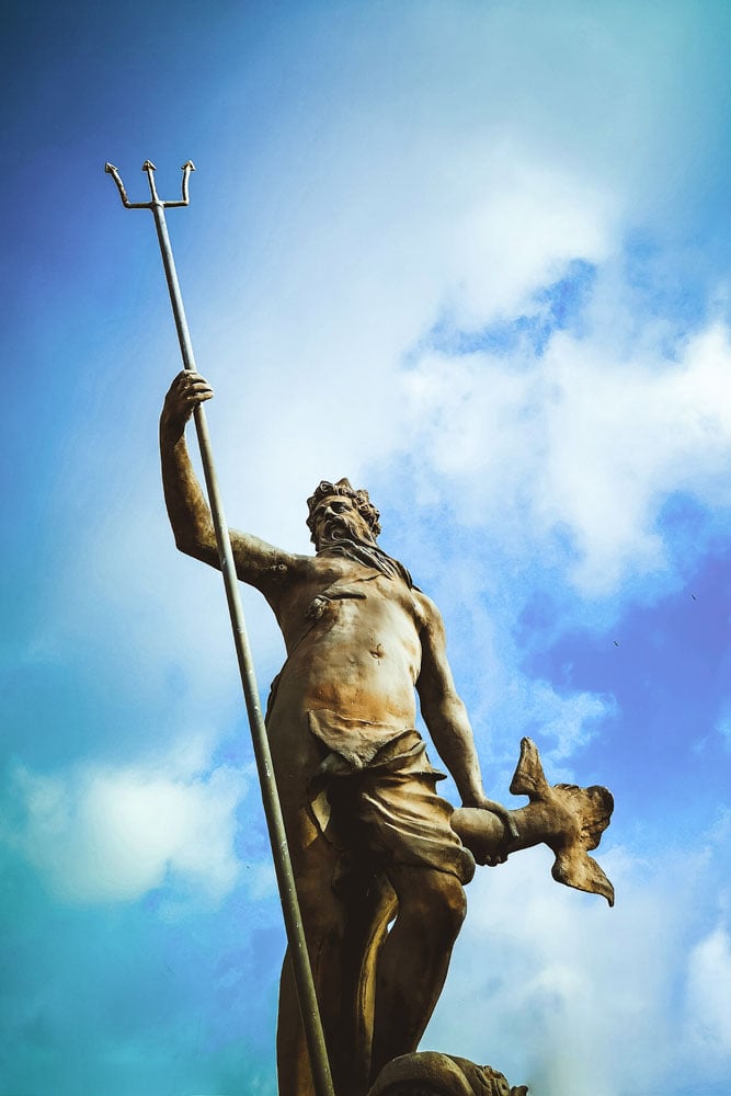 facts-about-greece-poseidon-statue-with-a-cloudy-background