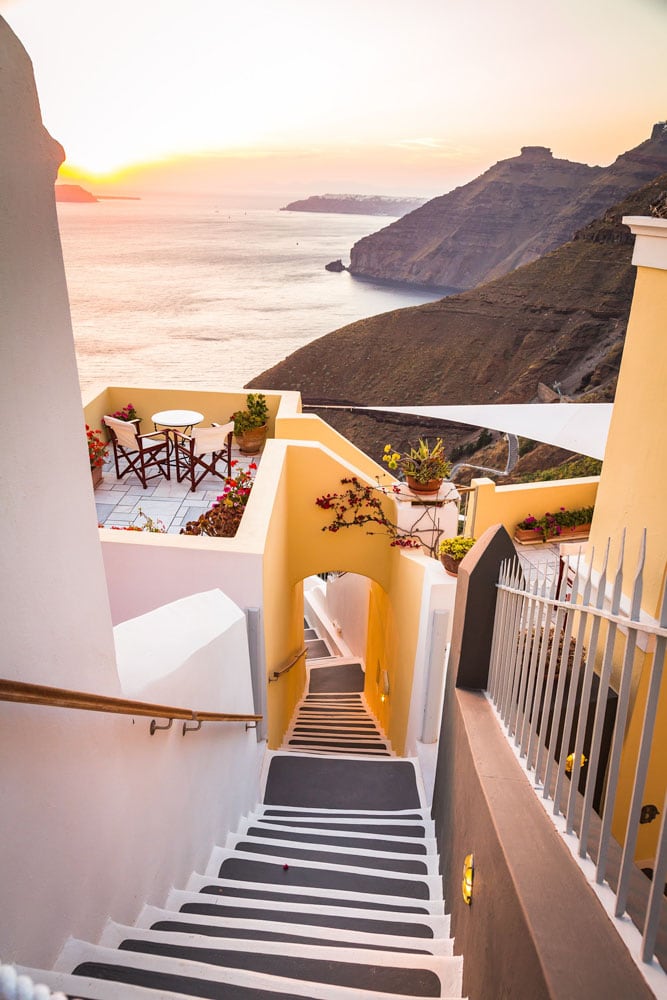 yellow-patio-in-santorini-with-the-ocean-in-the-background