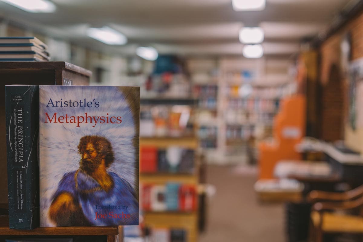 librar-with-aristotles-metaphysics-book-on-focus