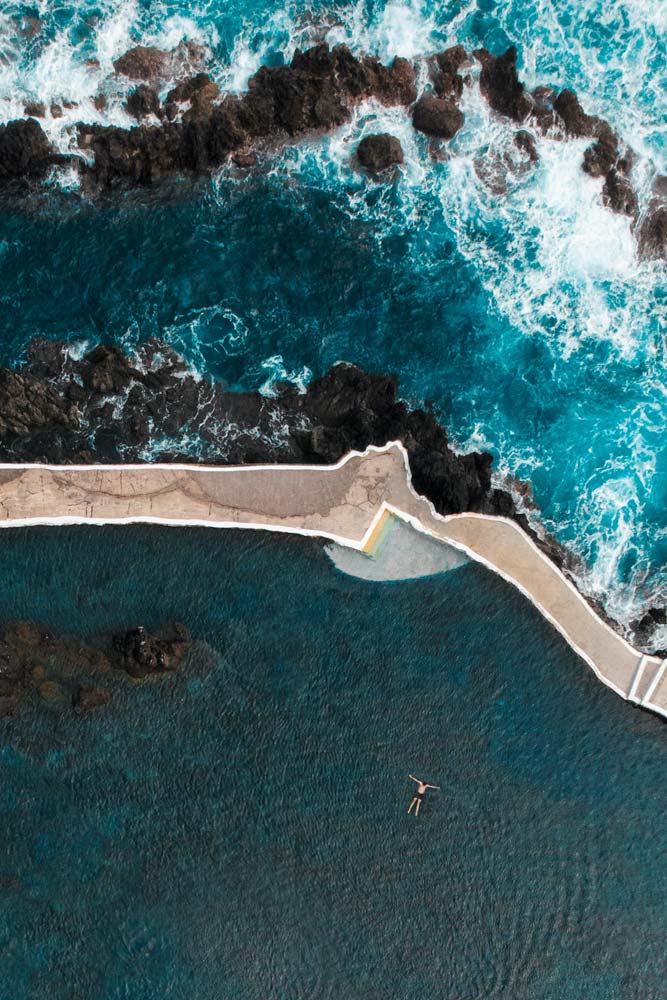 fun-facts-about-portugal-drone-photo-of-a-pool-next-to-the-ocean