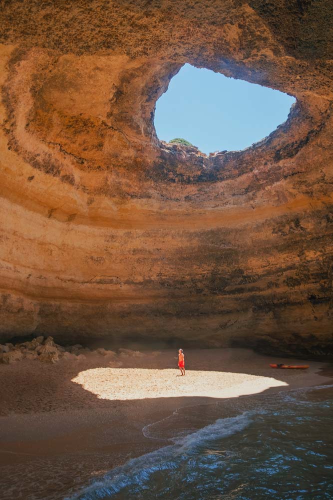 fun-facts-about-portugal-man-standing-on-a-sun-spot-in-a-cave-