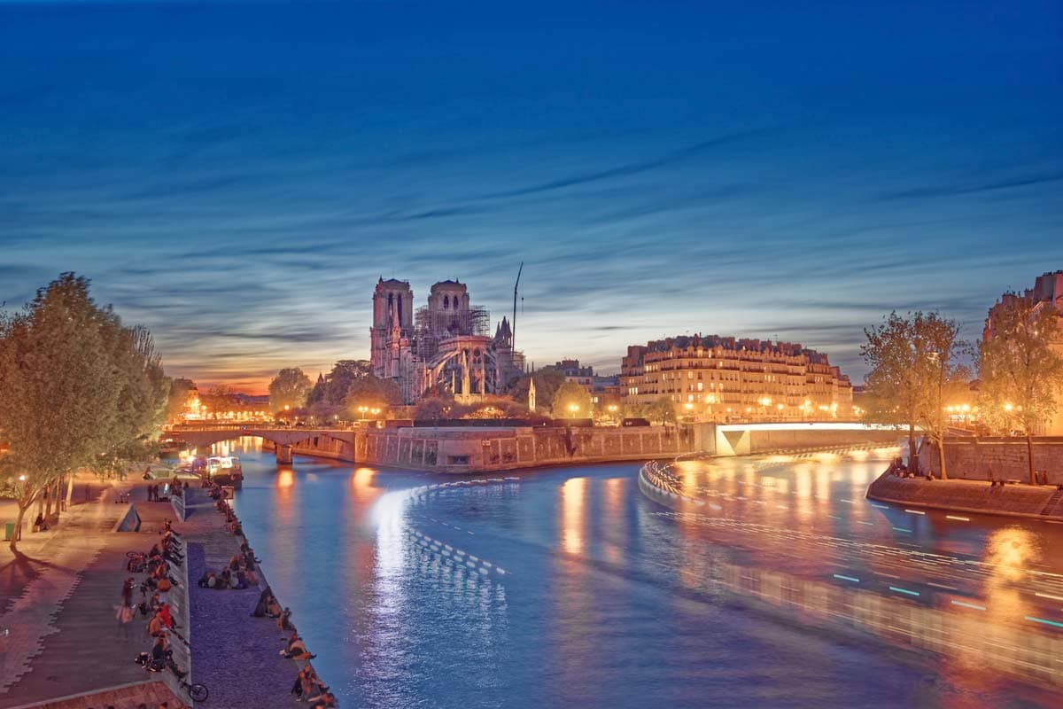 paris bucket list-river-seine-at-night-with-many-golden-lights