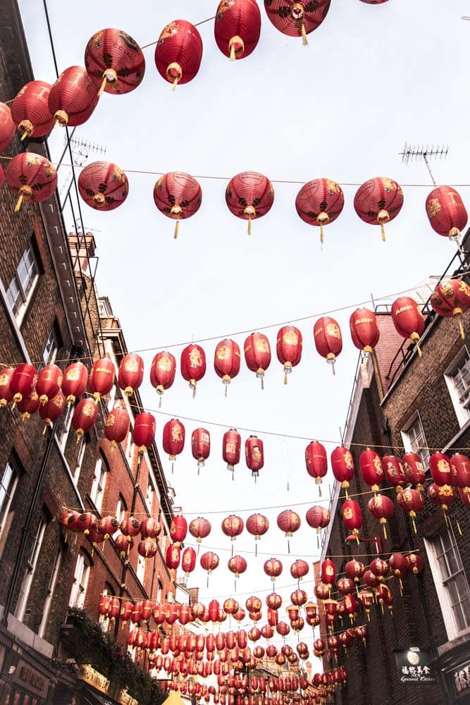 chinese-lanterns-between-brich-buildings