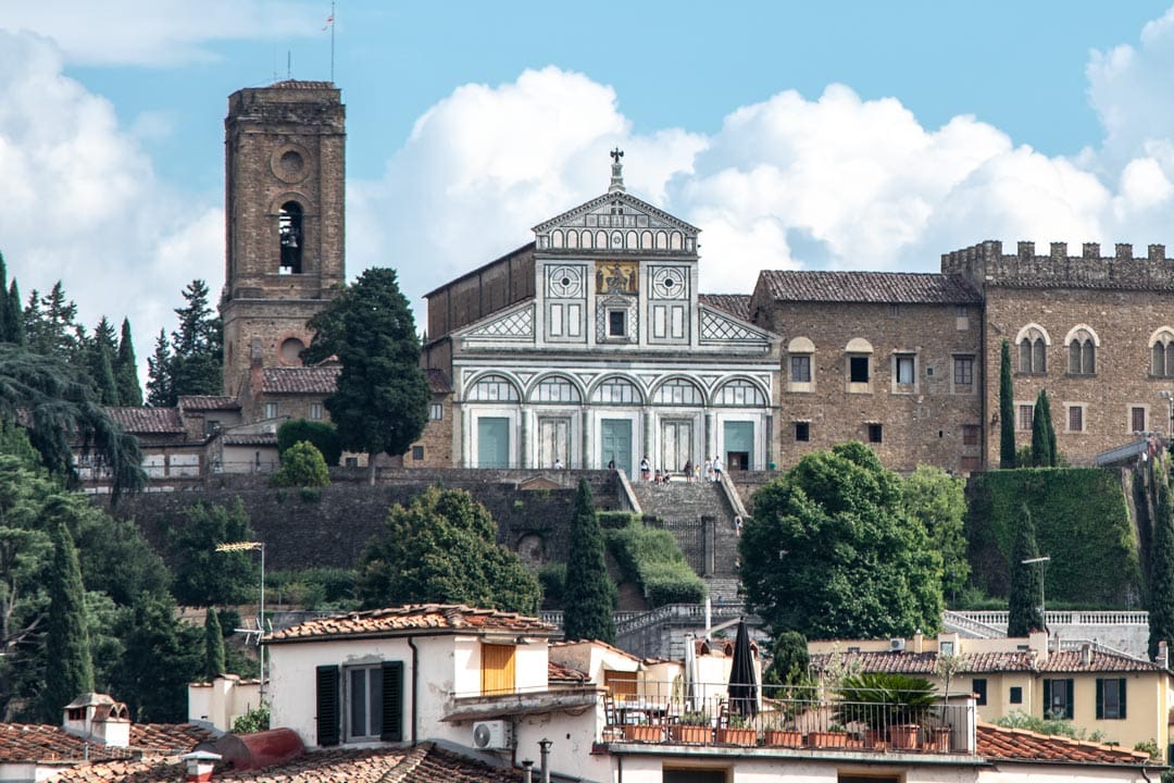 Abbazia-di-San-Miniato-al-Monte-with-rooftops-in-front