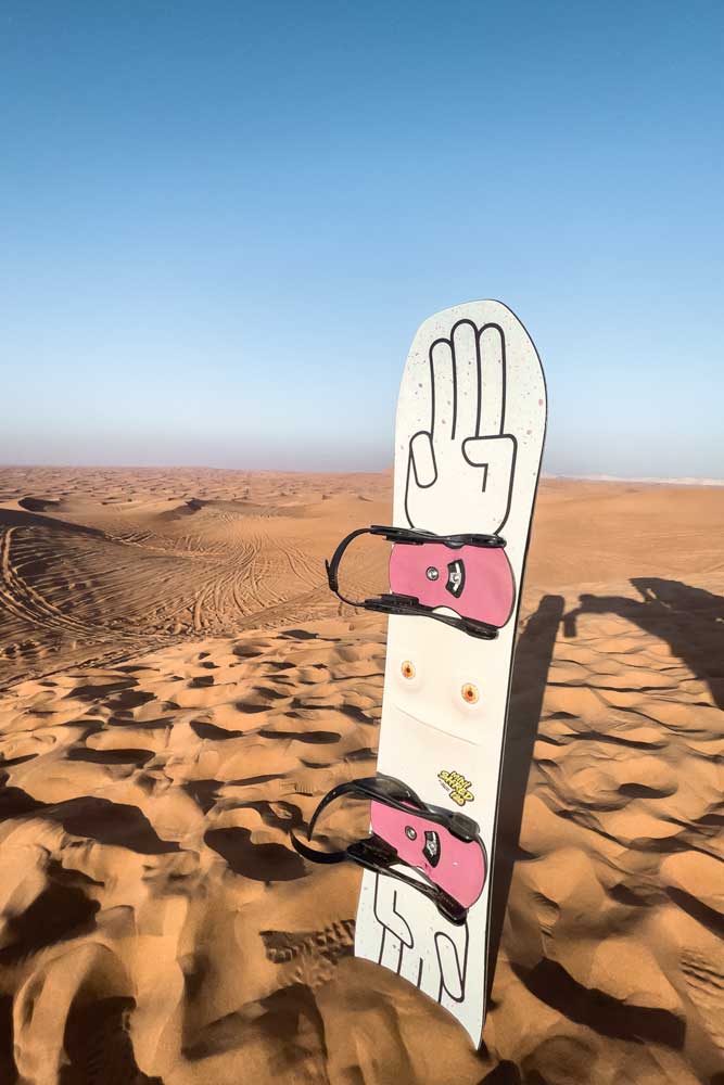 sandboard-in-the-desert