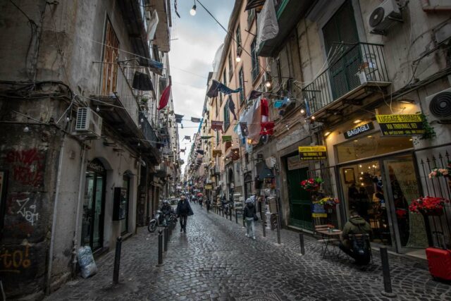 Man Walking On A Tiny Street In Naples 640x427 