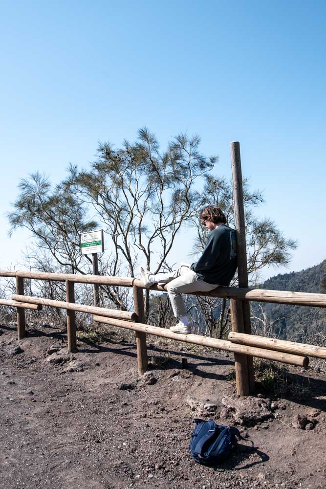 visiting-vesuvius-guy-reading-a-book-at-the-top