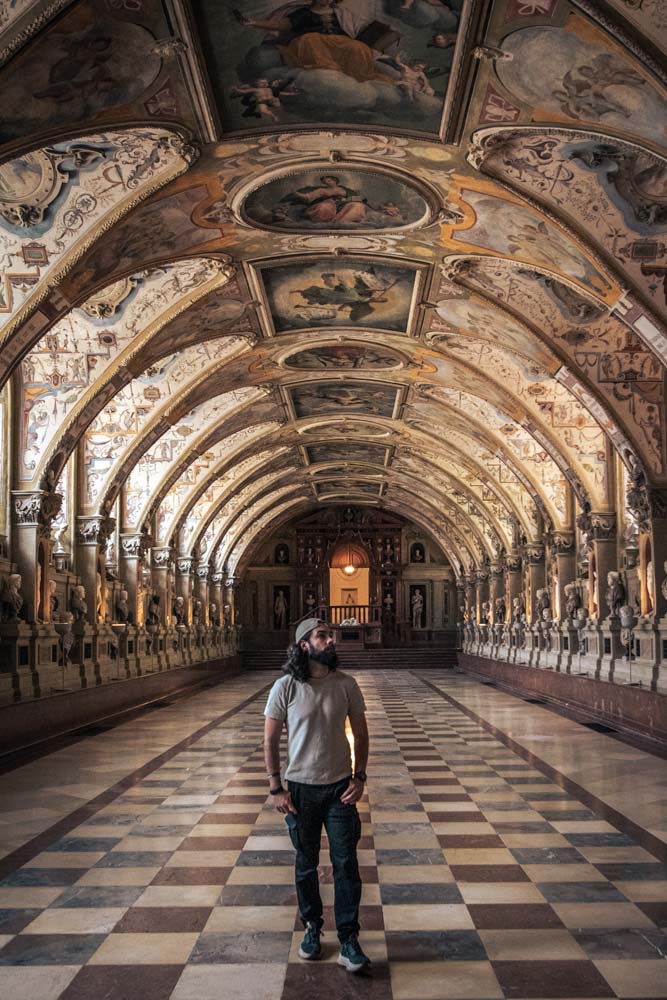2-day-munich-itinerary-man-walking-a-portrait-room-in-a-palace