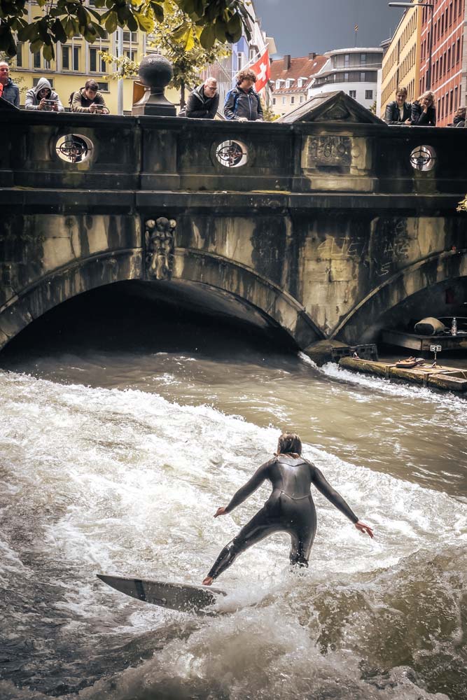 girl-surfing-in-a-river