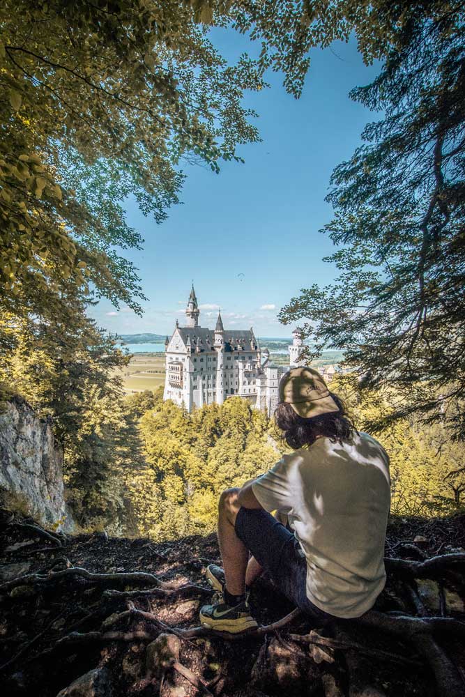 man-at-neuschwanstein-castle-awcret-photo-spot