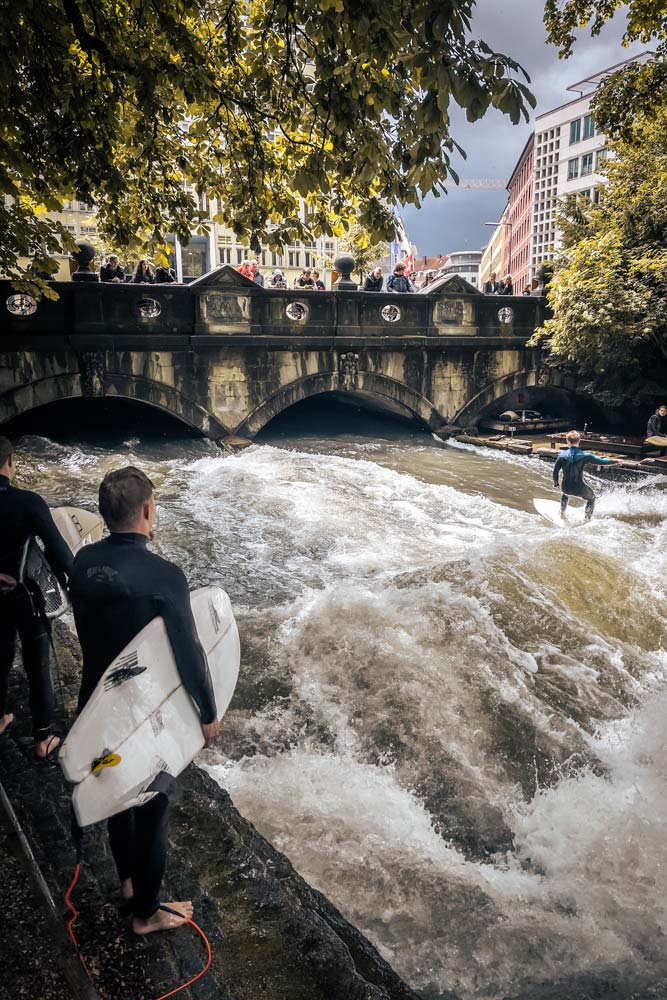top germany landmarks-surfers-in-a-river