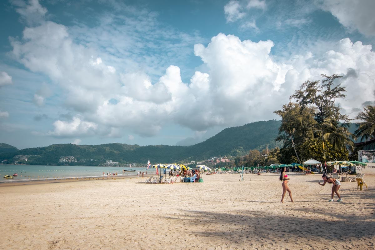 best-beaches-in-phuket-girls-taking-photos-on-patong-beach