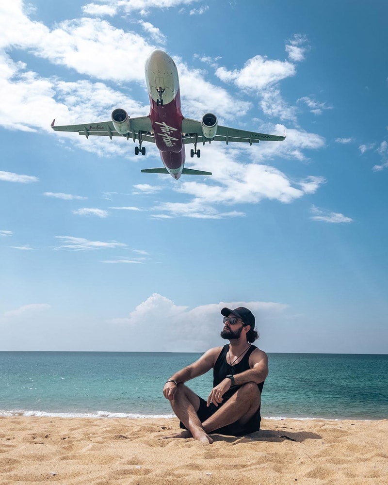 december in Thailand-man-under-a-plane