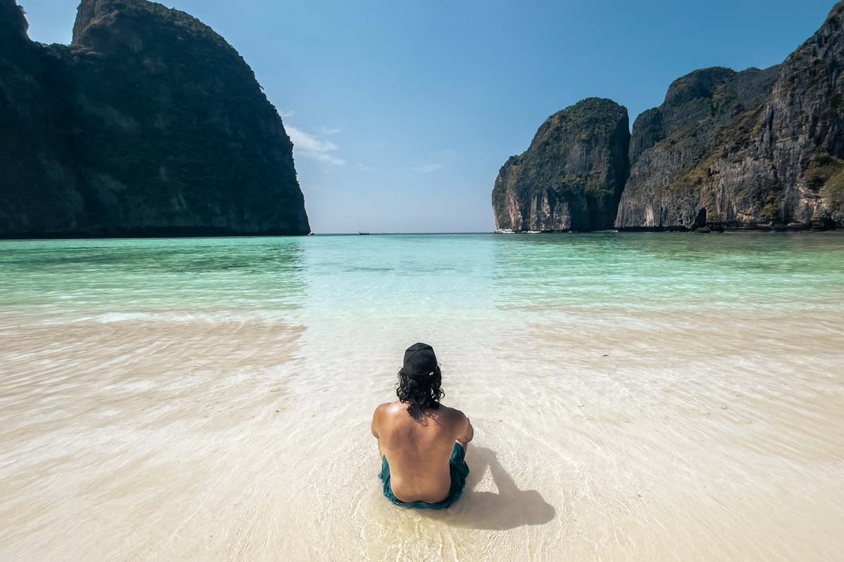 phi phi itinerary-man-on-the-beach-in-may-bay